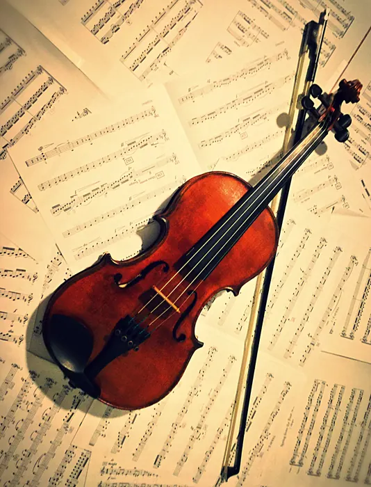 Violin over sheet music