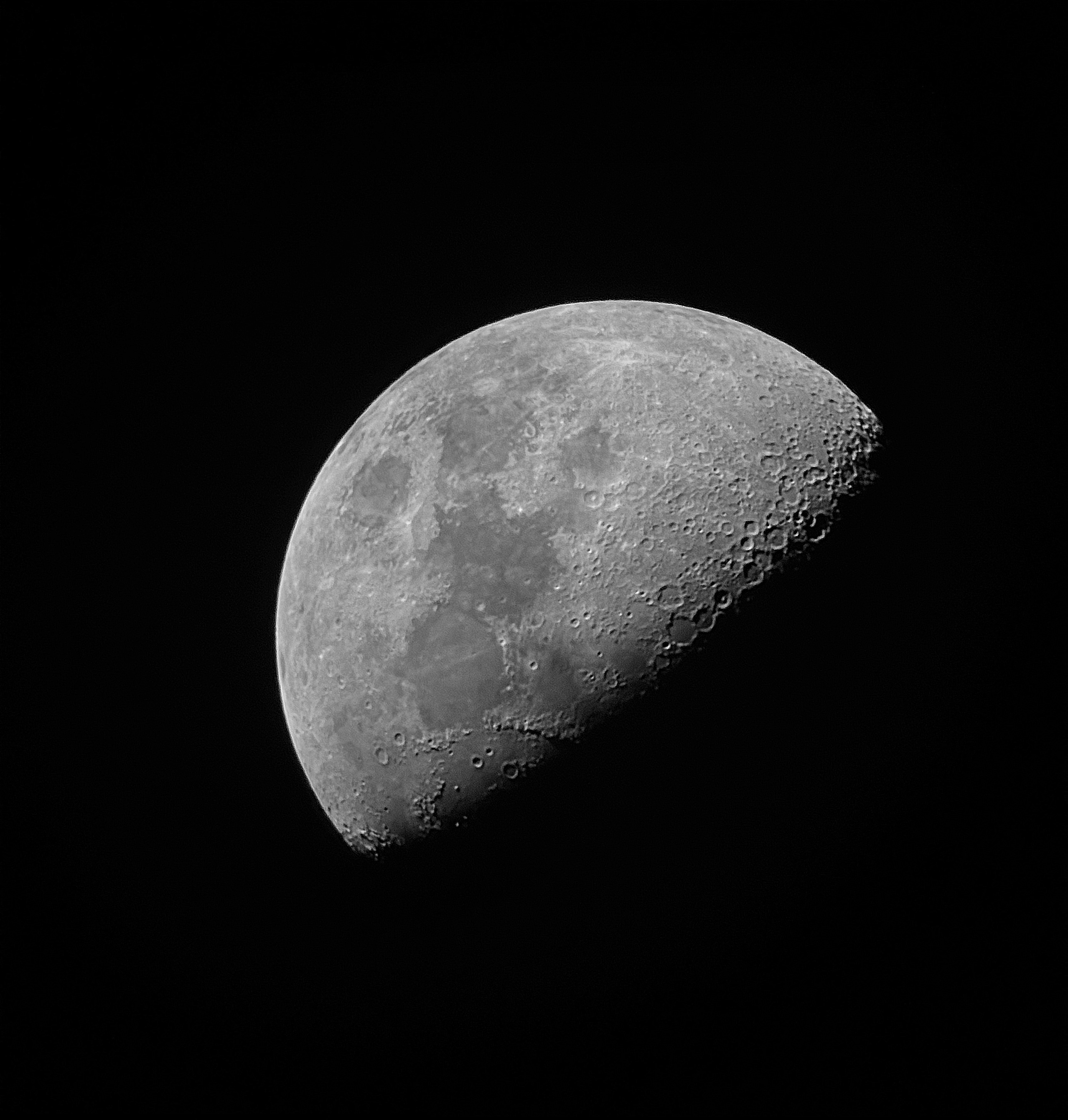 The highest quality image of the moon that I have so far. This depicts a half moon with the shadow in the bottom right.