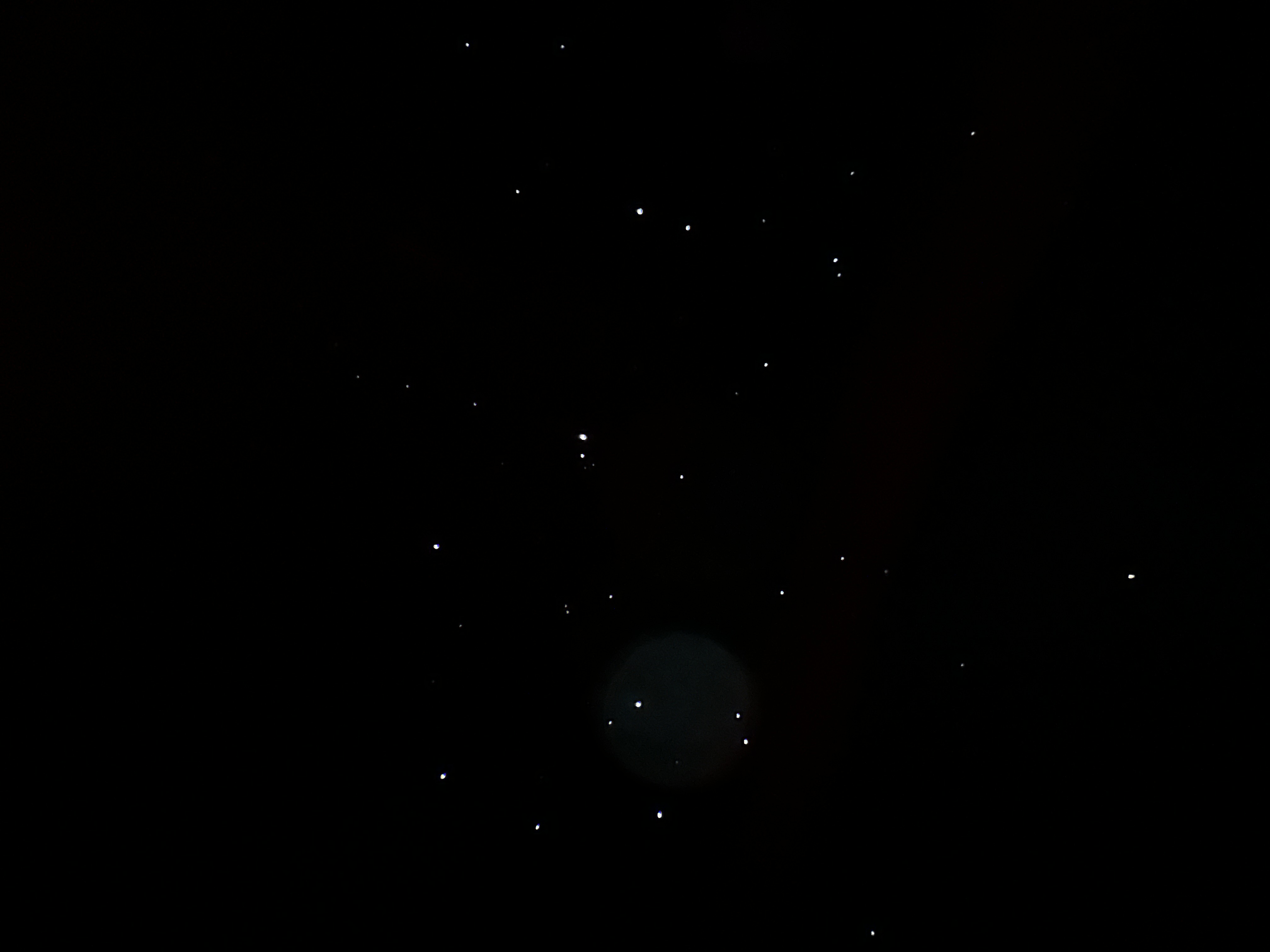 This is a close up image of the Pleiades Cluster. This image depicts many stars which make up the Pleiades Cluster.